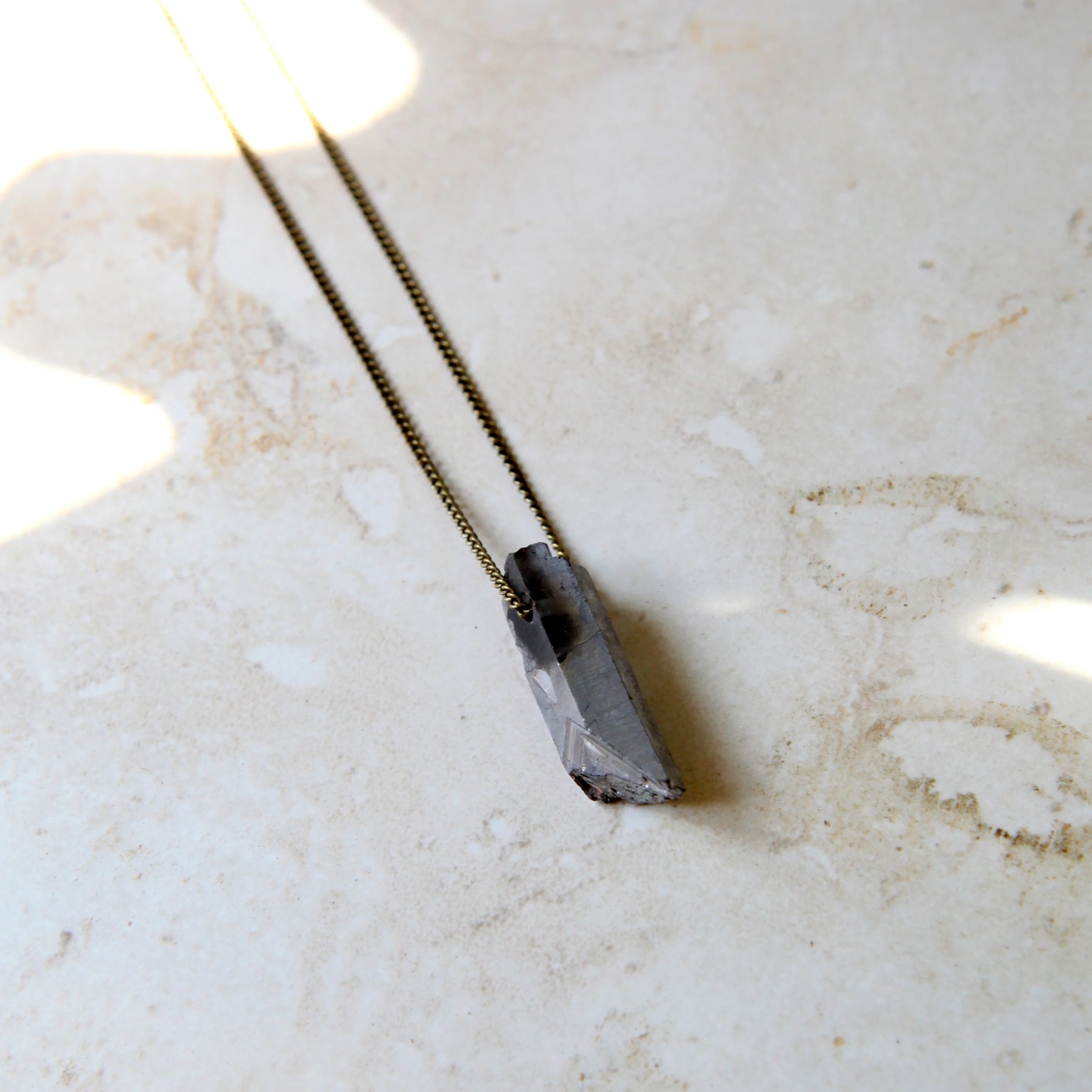 Metal Pendant -- $26.00.