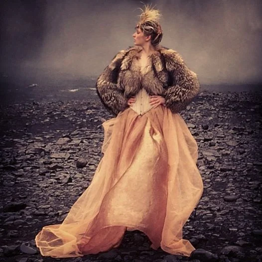 When it rains, use the iPhone. Model: Elena Sirina Stylist: Minna Attala Hair and make-up: Grace Gray Fur coat and headdress: National Theatre Corset: Stylist’s own Skirt from the stylist’s studio