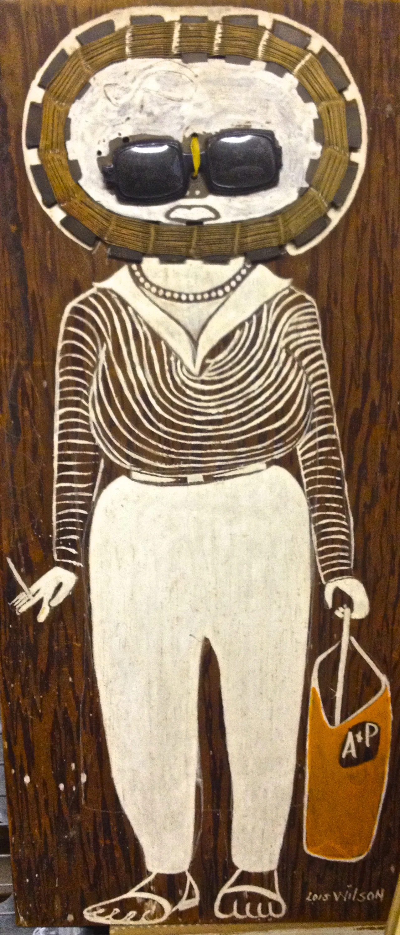 Lois Wilson, painting of a woman. She had hundreds of paintings of all sorts of people, all painted on found pieces of wood. 