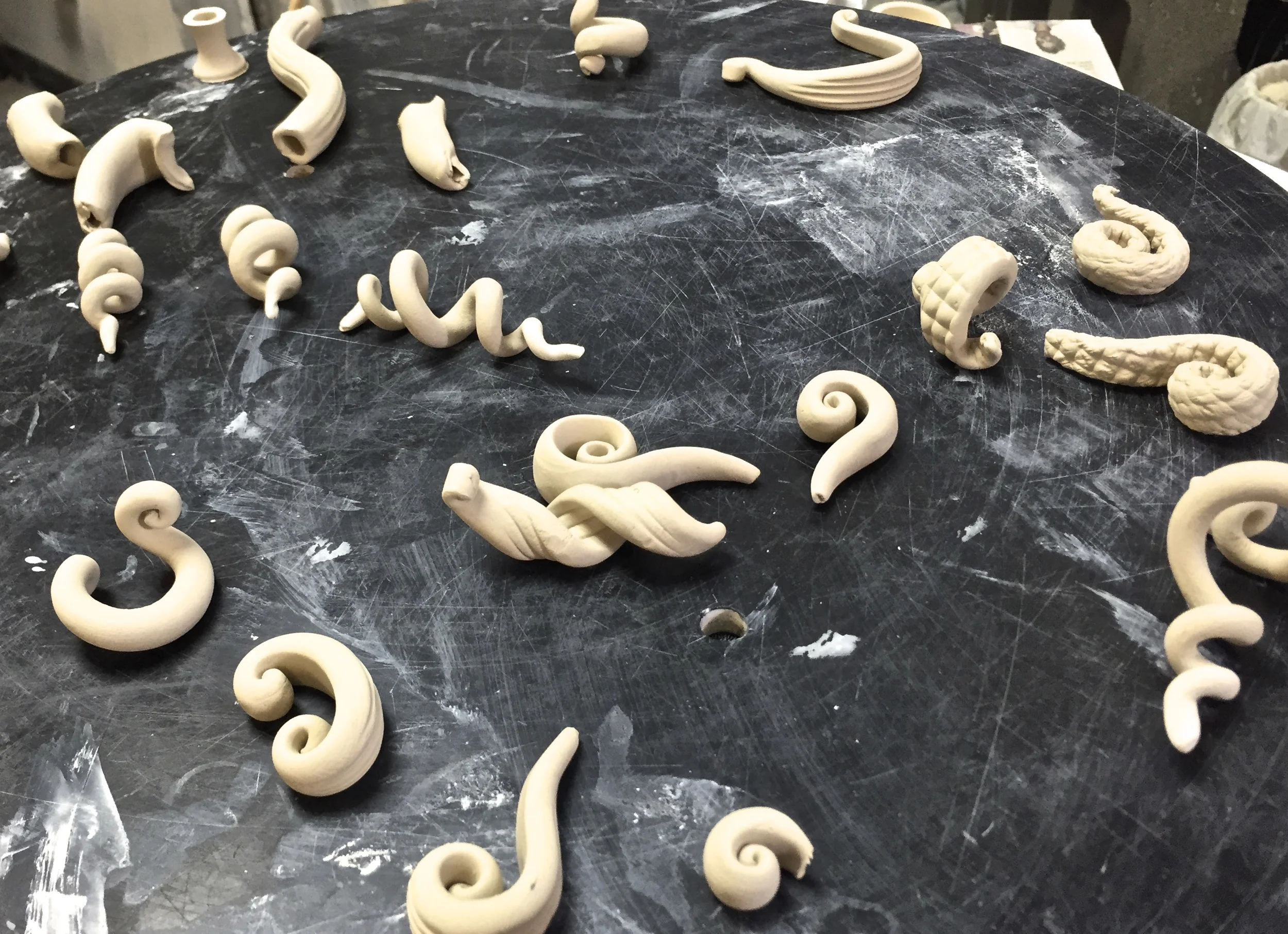 Various teapot handles.