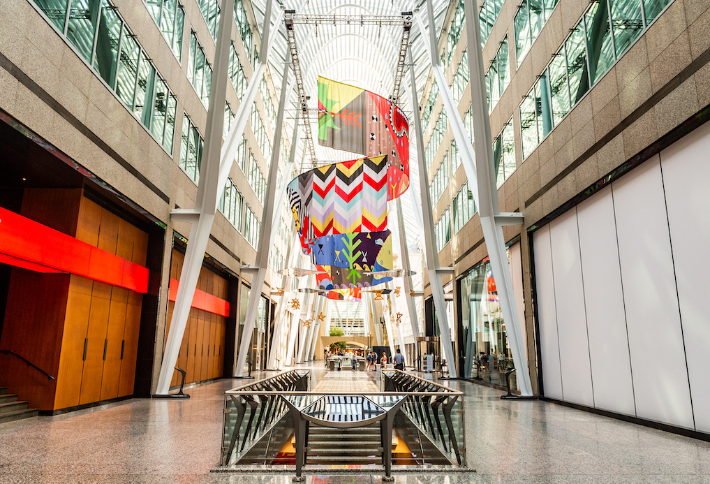   Tepkik, 2018    Materials:  Print on Polysilk, 3M reflective print on Aluminum panels  Dimensions:  100'x40'x25’  Photo:  Ernesto Di Stefano  Installation commissioned by Brookfield Place Toronto.  Produced by Pearl Wagner Art Consultants.  Project