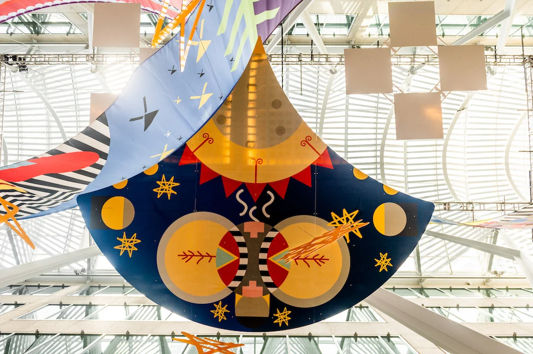 Tepkik, 2018 Materials: Print on Polysilk, 3M reflective print on Aluminum panels Dimensions: 100'x40'x25’ Photo: Ernesto Di Stefano Installation commissioned by Brookfield Place Toronto. Produced by Pearl Wagner Art Consultants. Project managed by IOTA STUDIOS