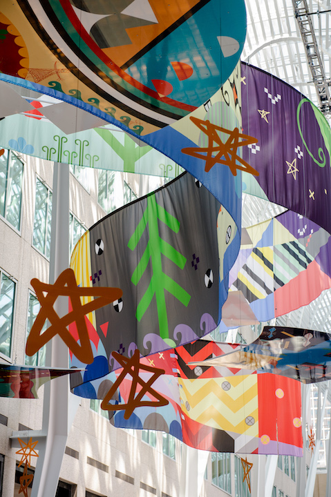   Tepkik, 2018    Materials:  Print on Polysilk, 3M reflective print on Aluminum panels  Dimensions:  100'x40'x25’  Photo:  Ernesto Di Stefano  Installation commissioned by Brookfield Place Toronto.  Produced by Pearl Wagner Art Consultants.  Project