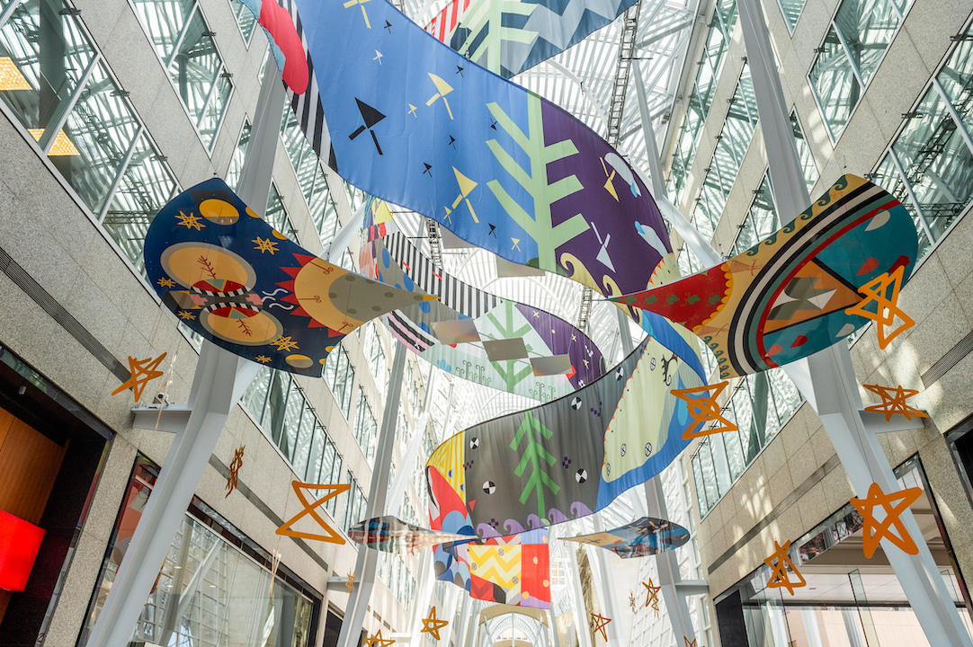   Tepkik, 2018    Materials:  Print on Polysilk, 3M reflective print on Aluminum panels  Dimensions:  100'x40'x25’  Photo:  Ernesto Di Stefano  Installation commissioned by Brookfield Place Toronto.  Produced by Pearl Wagner Art Consultants.  Project