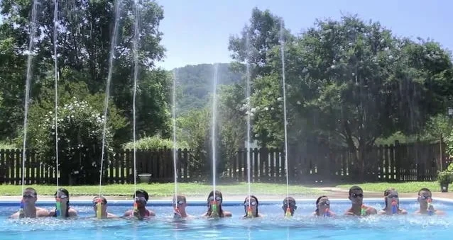 Online Video for HTH Pool Care: "Kids Perform Water Show in Neighborhood Pool"