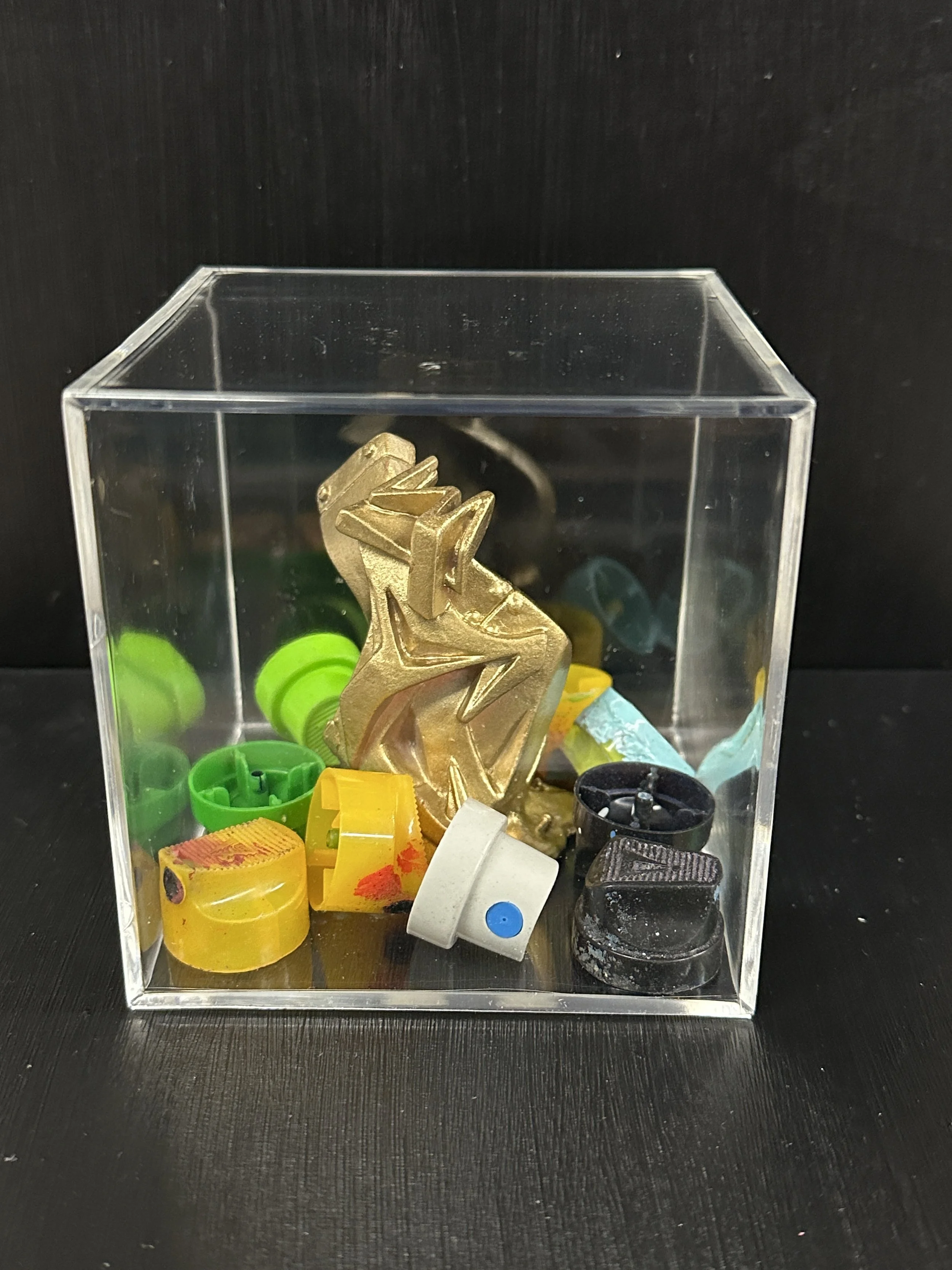 "MAN ONE ARMY" - Resin Sculptures (in display case)