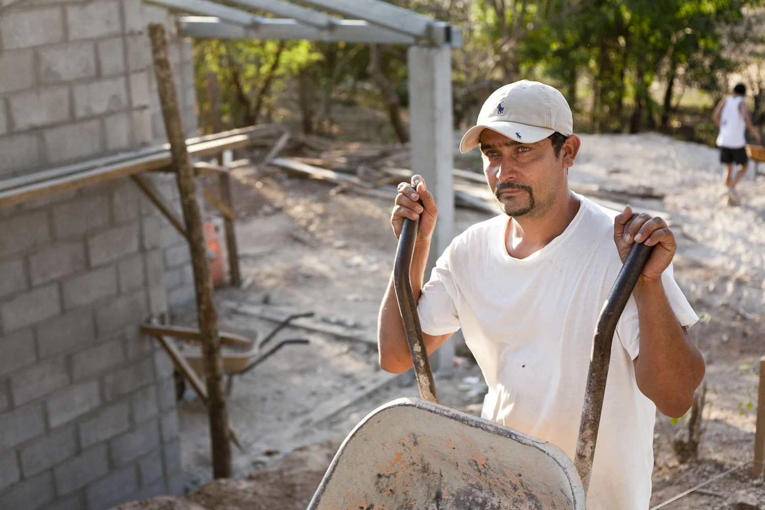 Catalino Abarca, a construction worker for the last 12 years, works for
Asociación Agropecuaria Campesina para El Desarrollo del Norte de San
Vicente (ACD), a non-governmental organization that builds houses in
Amatitán. The houses, which cost $6,800 to construct, are given to
recipients picked through a rigorous need-based selection process.