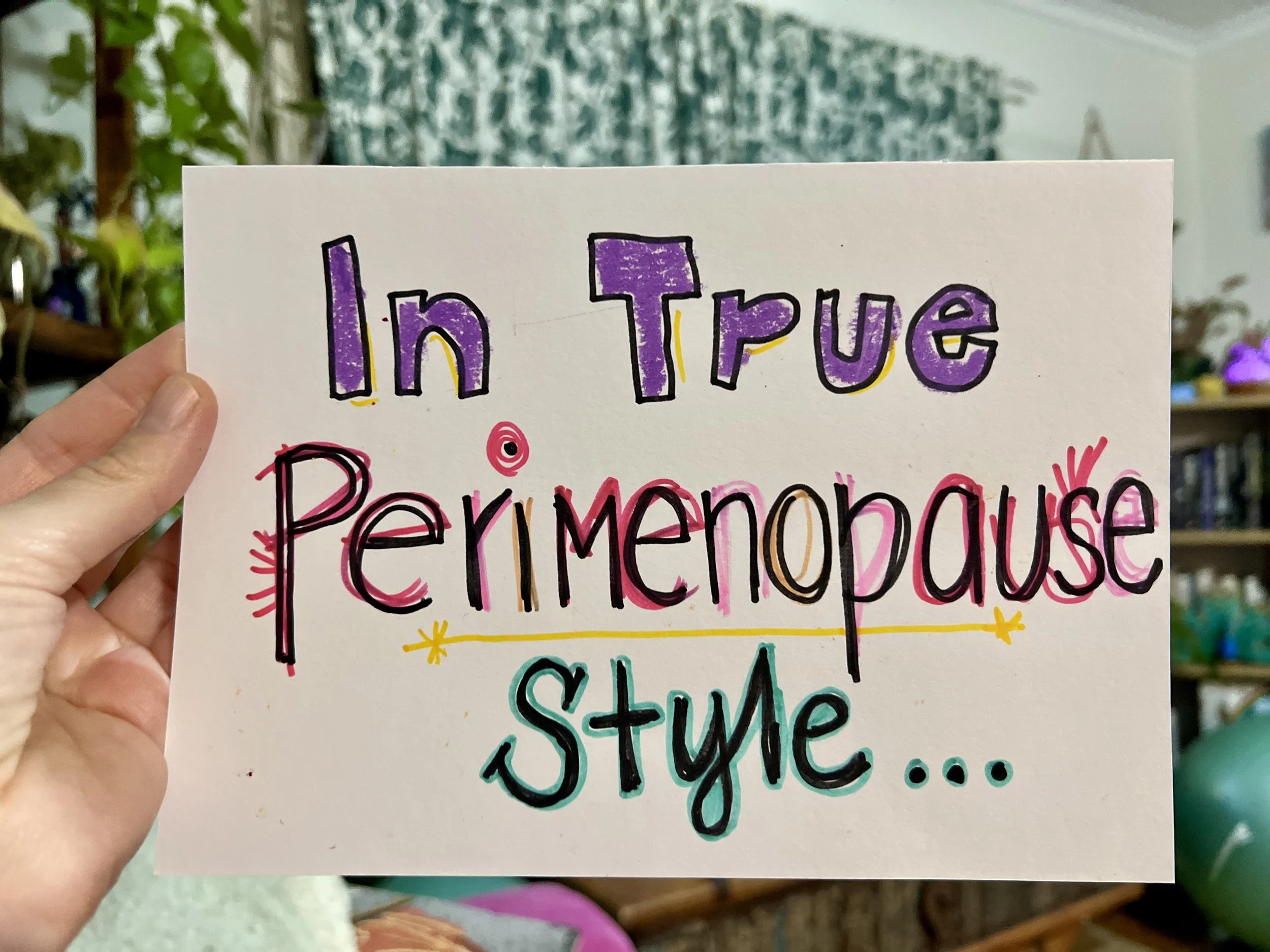 a hand holding a card that says In True Perimenopause Style