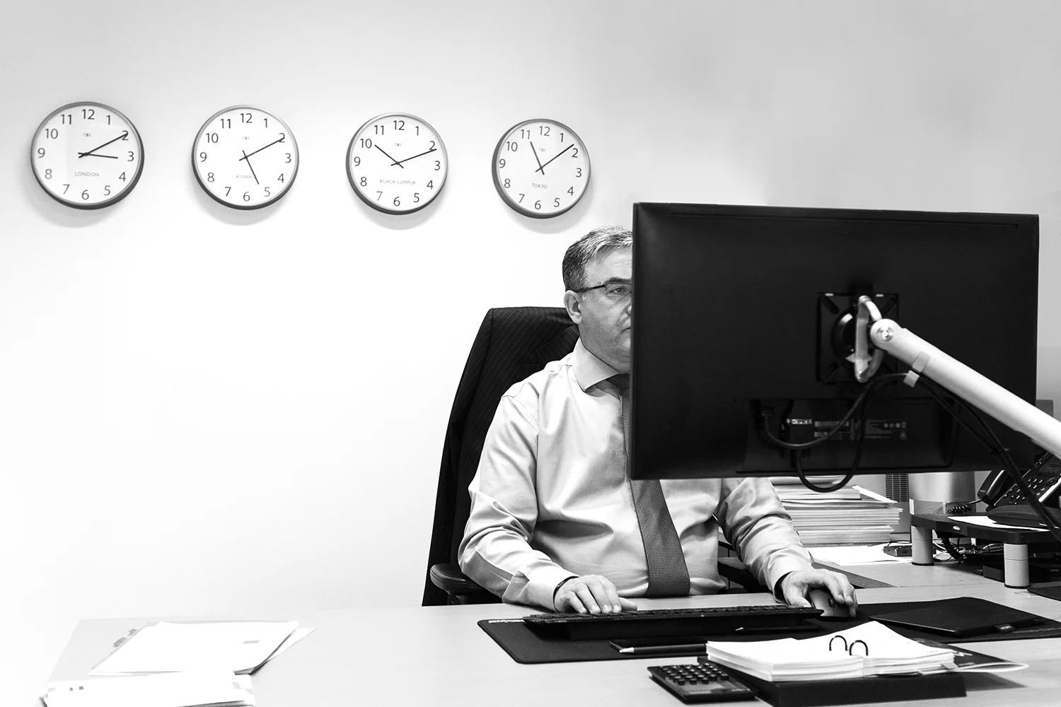 Man sitting at computer screen