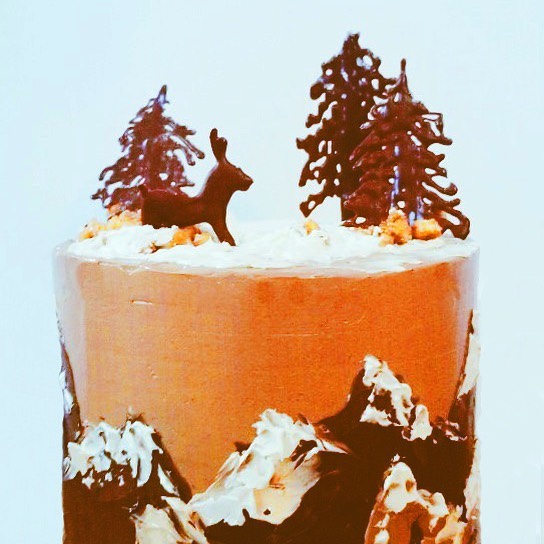 DAY 7 - chocolate peanut butter cake from last night's cake week showstopper! This was my intended design of sculpted / painted buttercream mountains complete with some very PNW trees and a reindeer. The deer on top is a little wonky here but you get