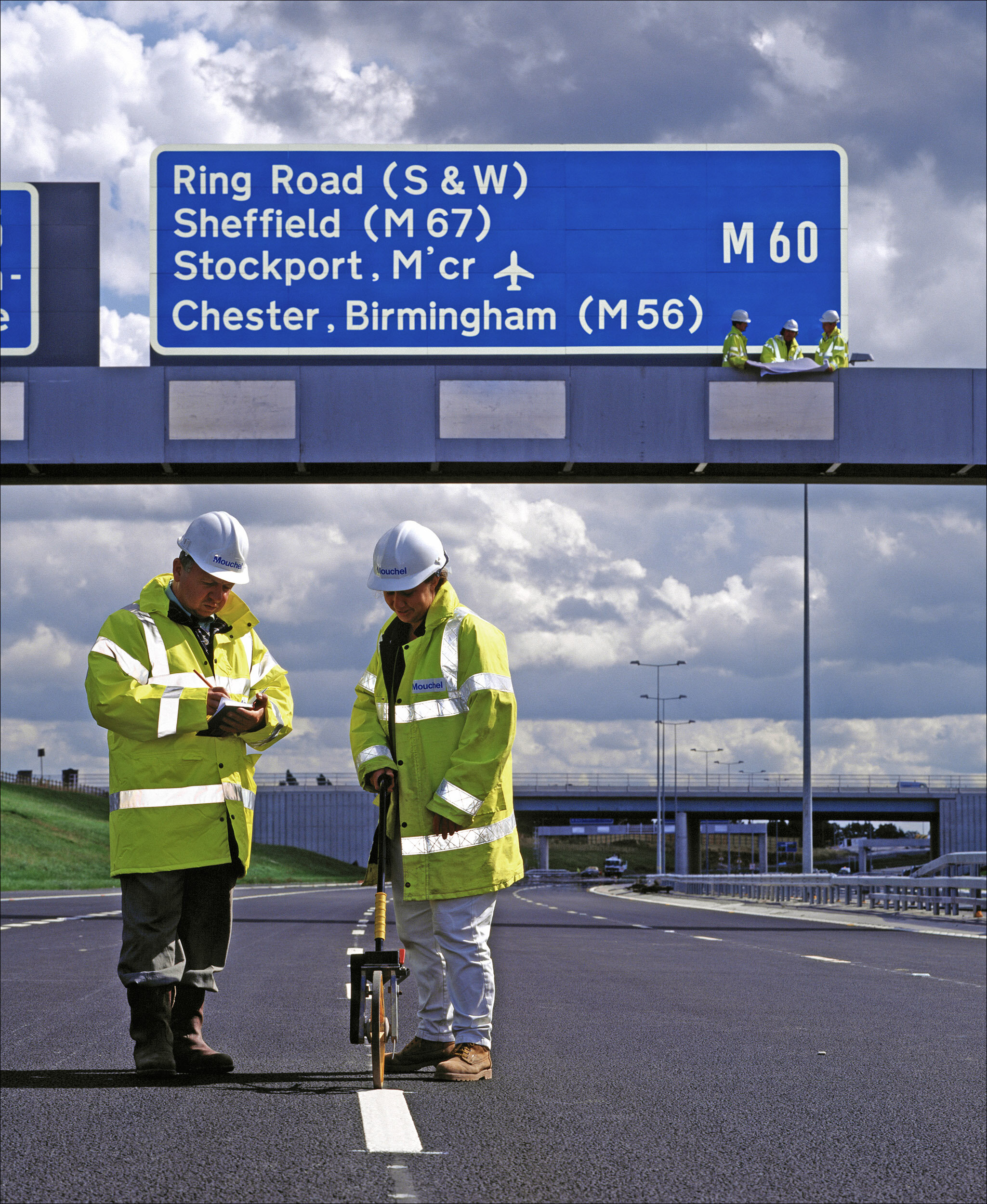 Engineers working in PPE on M60 Motorway