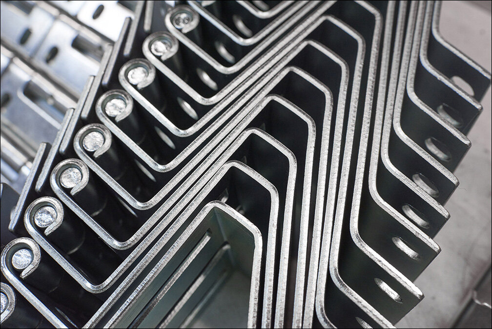 abstract close-up of steel roller shutter door components