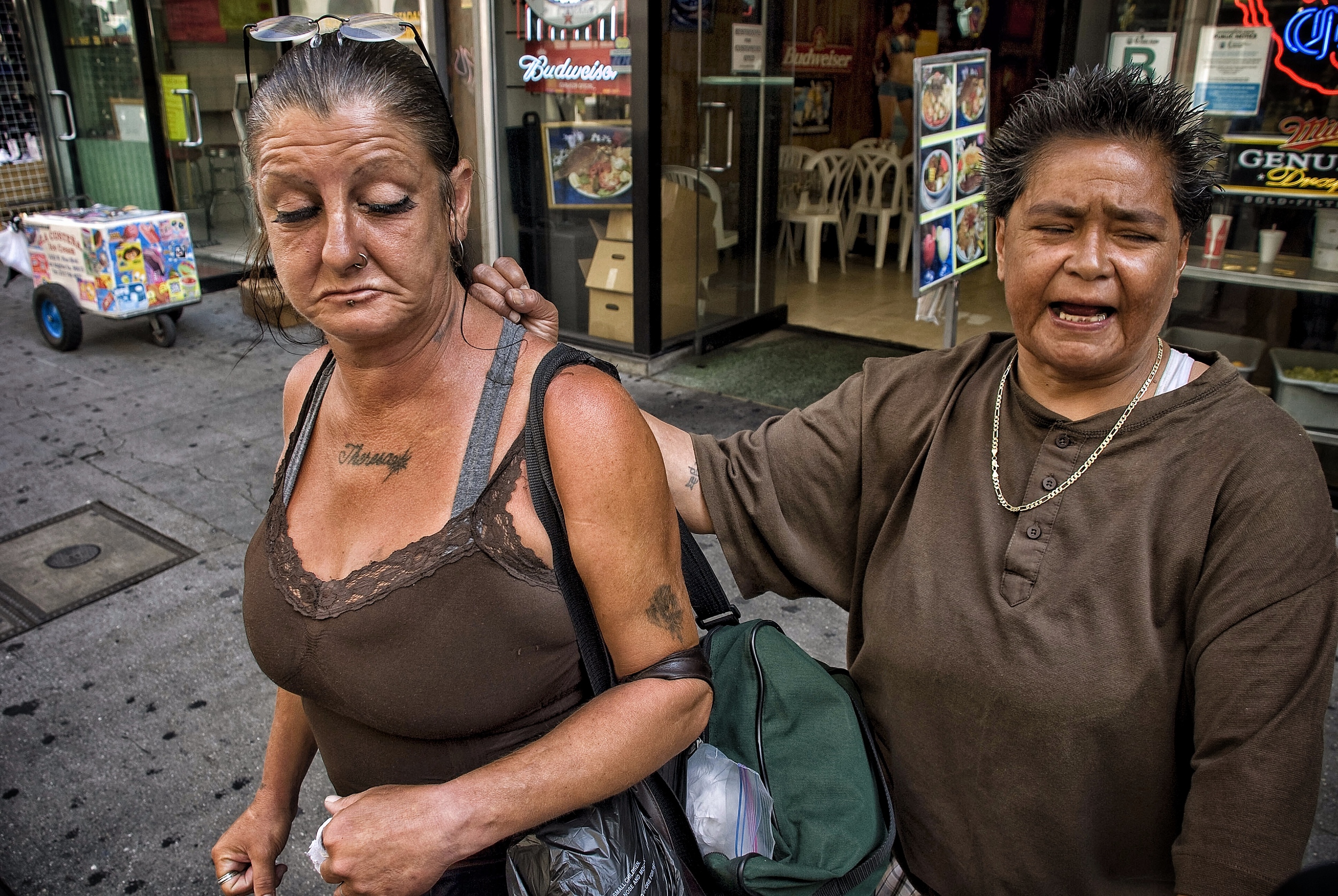  Los Angeles, 2009. Telling the story of how they were burnt out of their Skid Row shelter... 