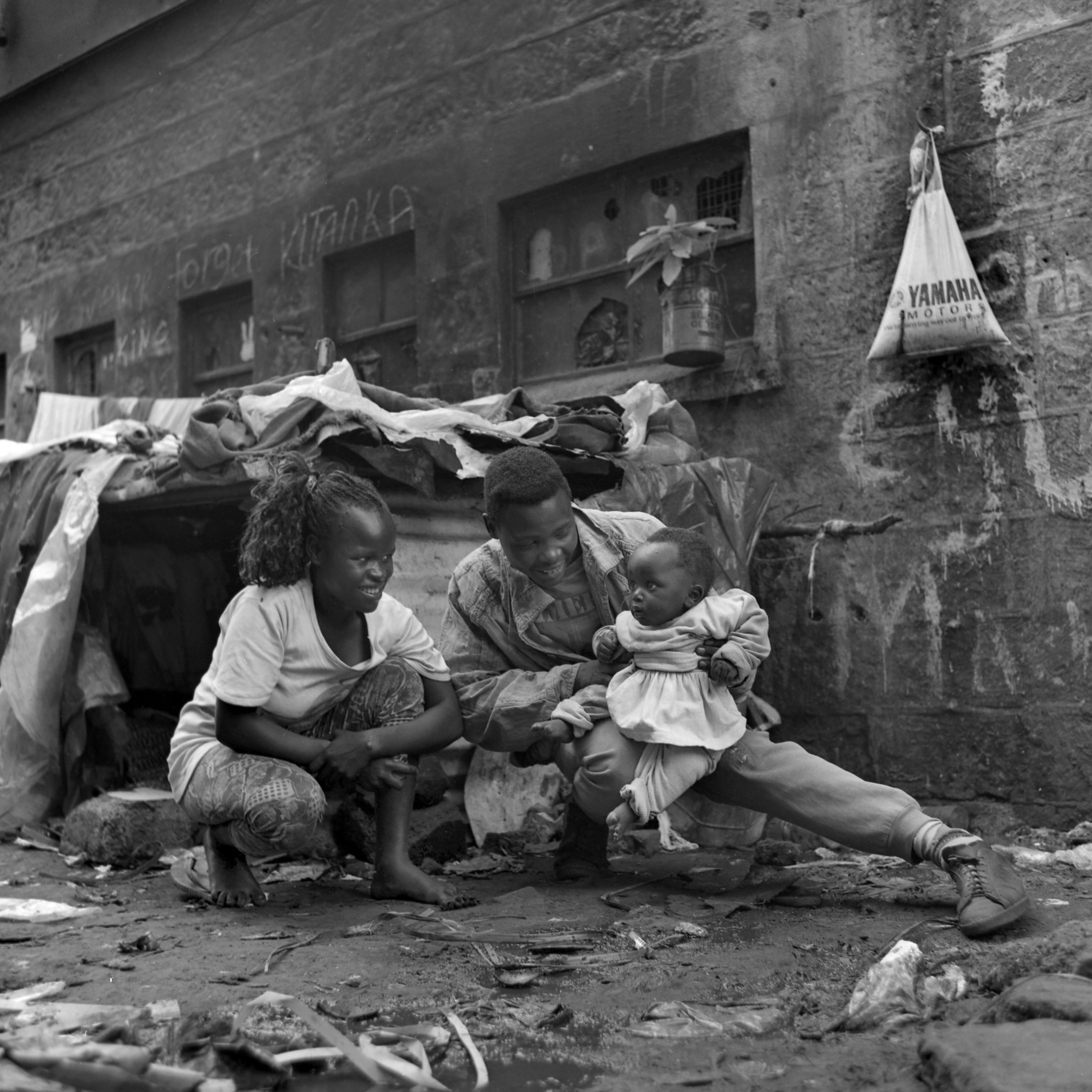  Young family living in alleyway  chuom , Nairobi. 