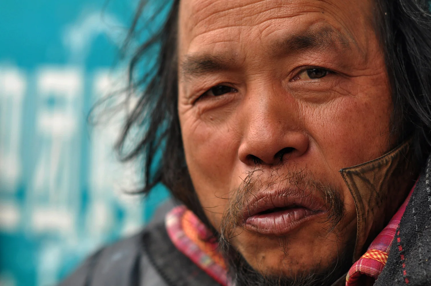 Homeless man, Han Zheng Street, Wuhan, 2015