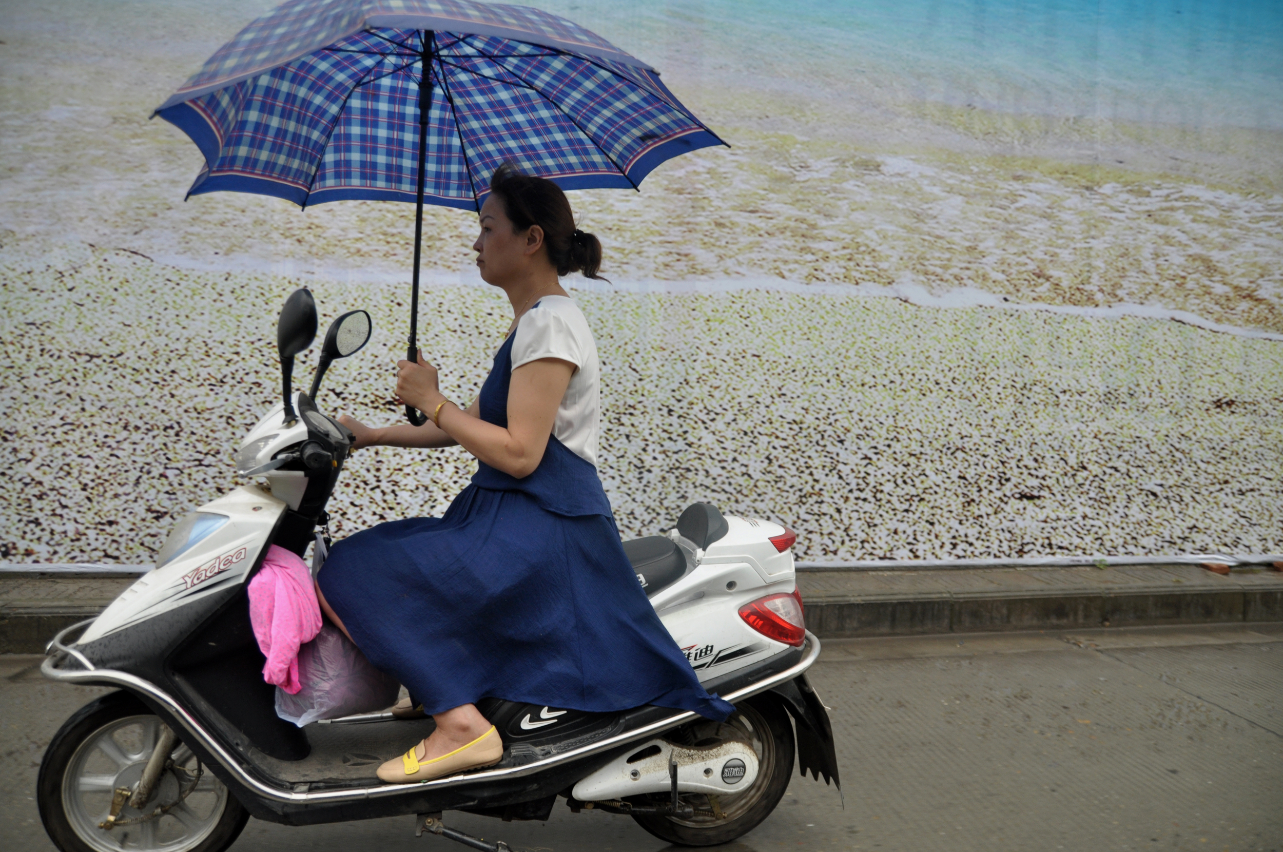 WOMAN ON SCOOTER.jpg