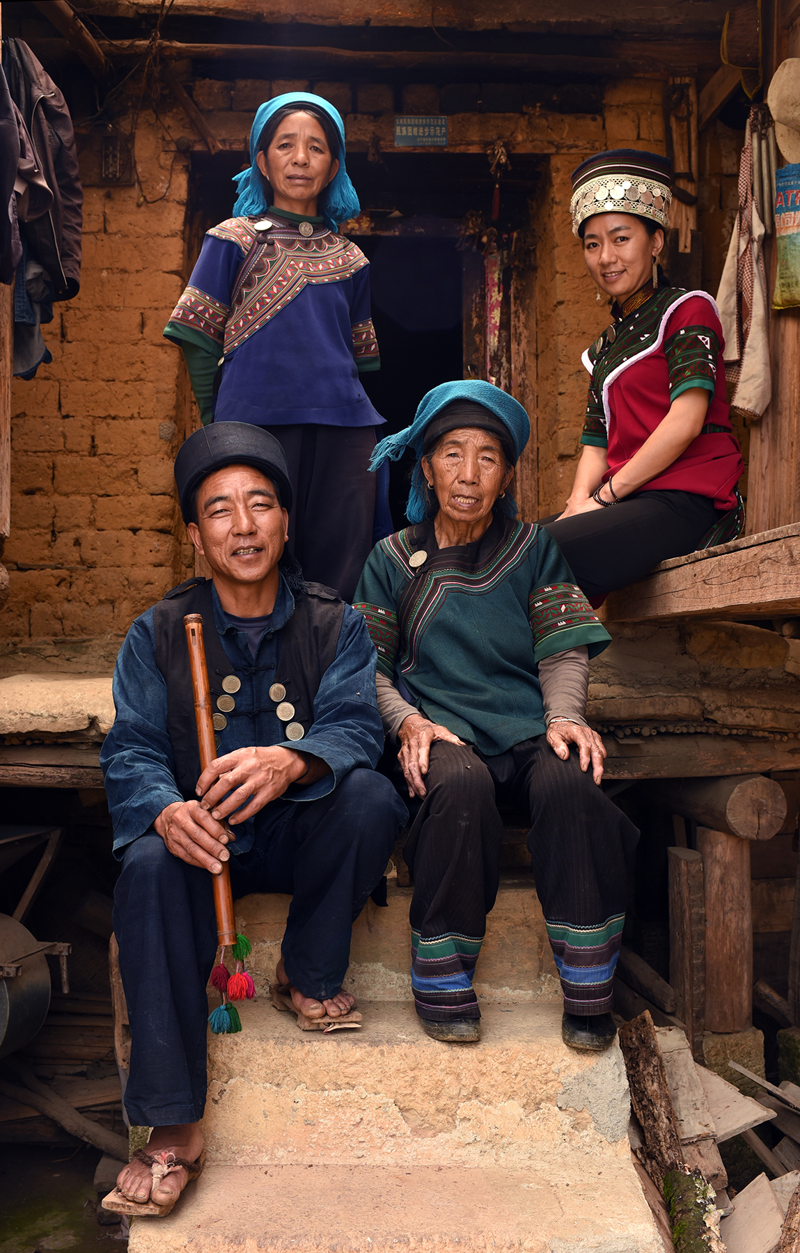  Chen XiNiang, inheritor of polyphonic singing intangible cultural heritage,&nbsp;at home with his family, Luomo village, Yunnan, 2017. 