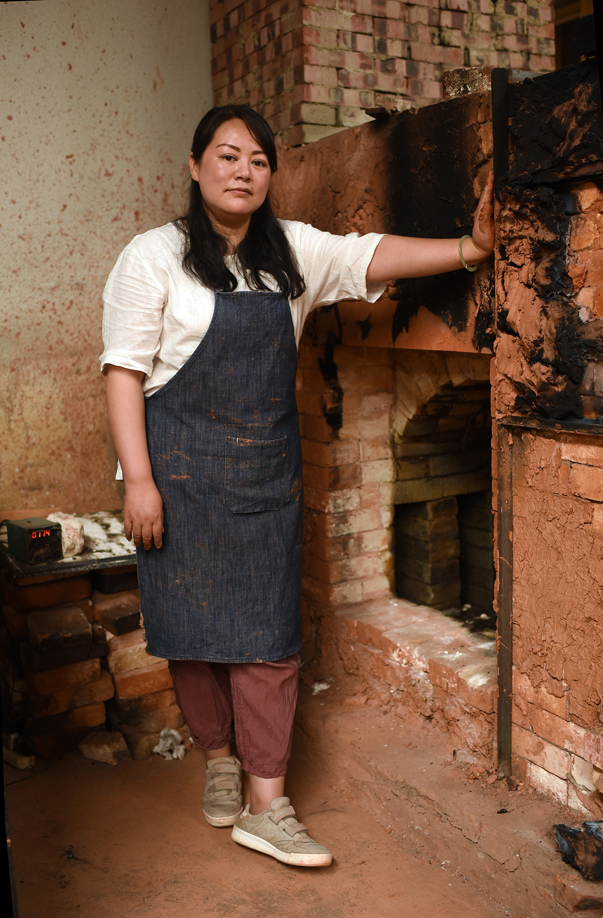  Pan Juan, Inheritor of Purple Pottery Intangible Cultural Heritage, Jianshui, Yunnan Province. 