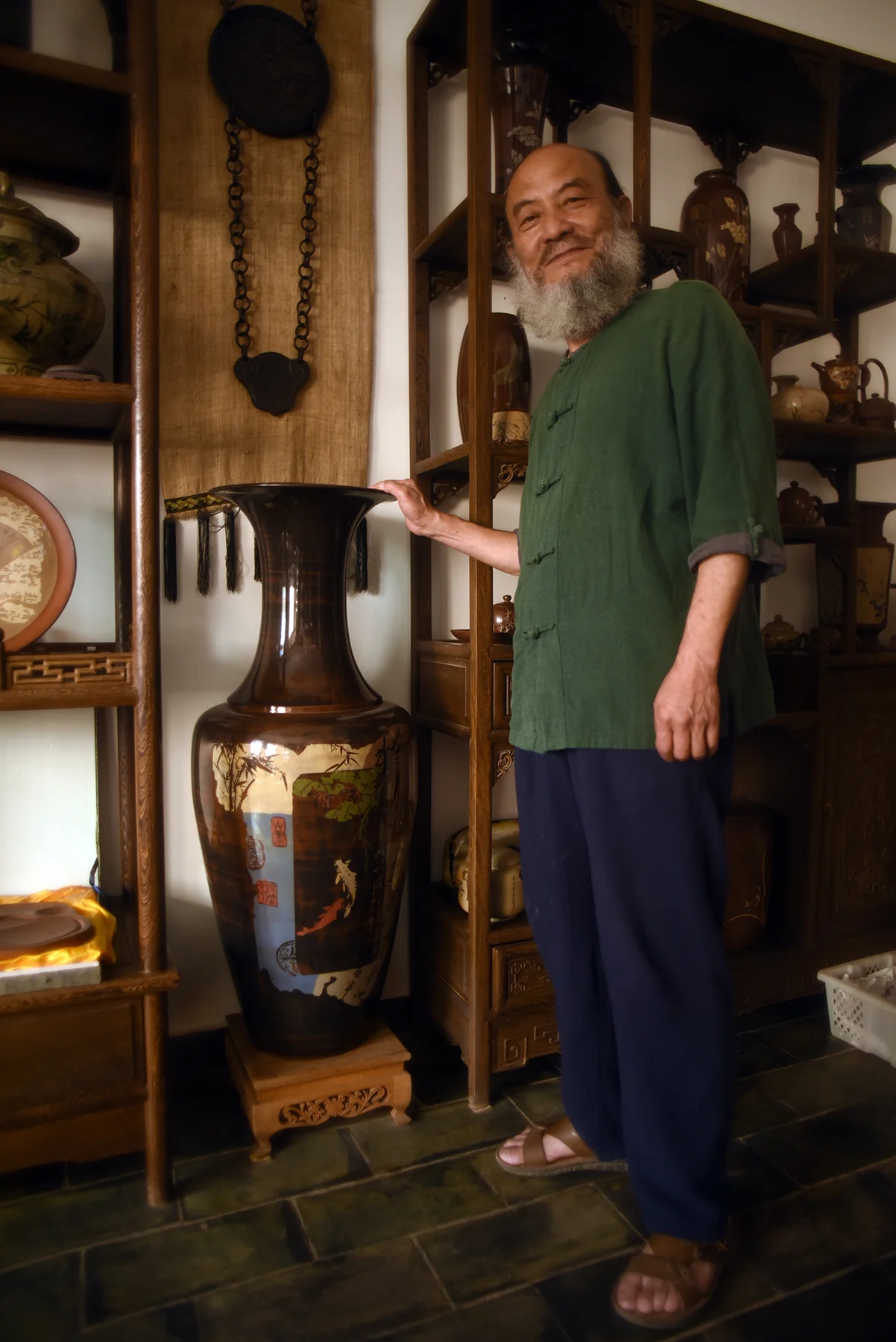 Tan Zhi Fan, Inheritor of Purple Pottery Intangible Cultural Heritage, Jianshui, Yunnan Province.