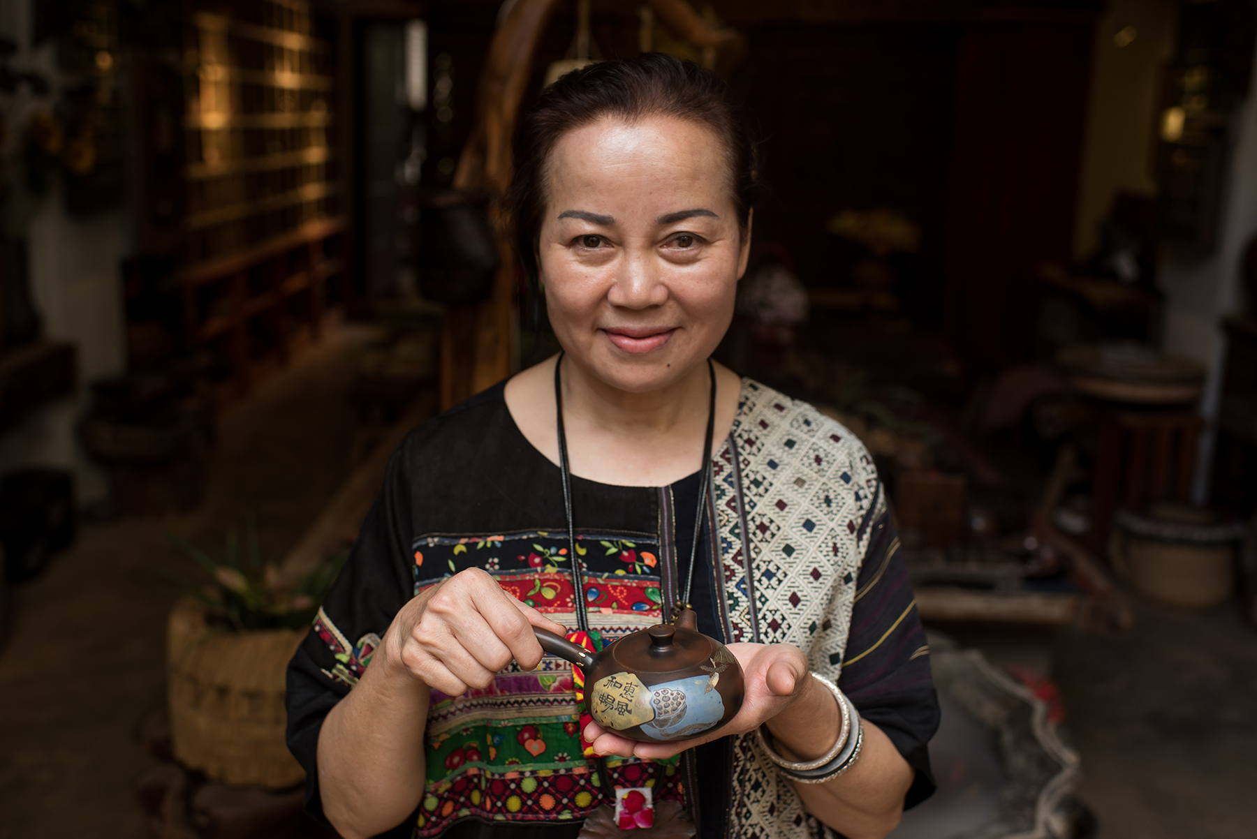  Li Fen Yu, Inheritor of Purple Pottery Intangible Cultural Heritage, Jianshui, Yunnan Province. 