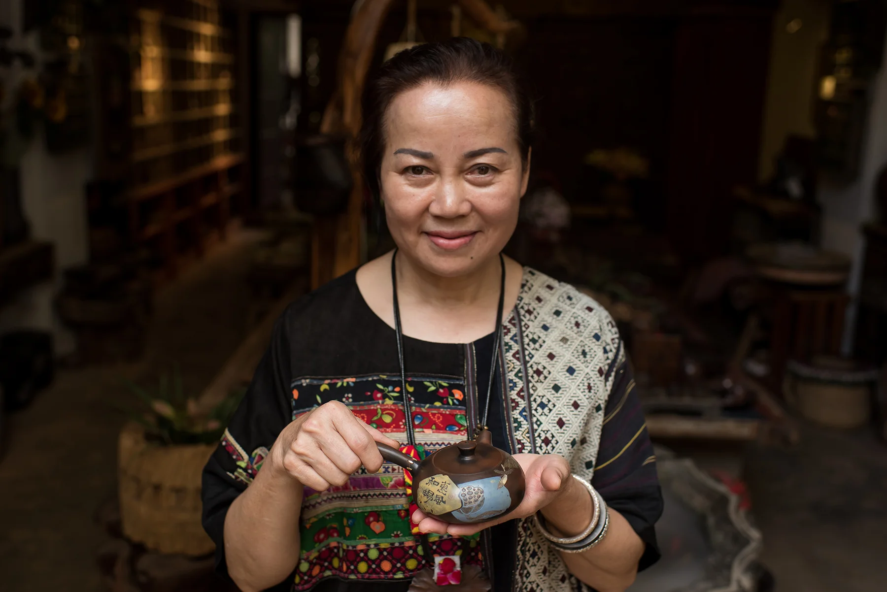 Li Fen Yu, Inheritor of Purple Pottery Intangible Cultural Heritage, Jianshui, Yunnan Province.