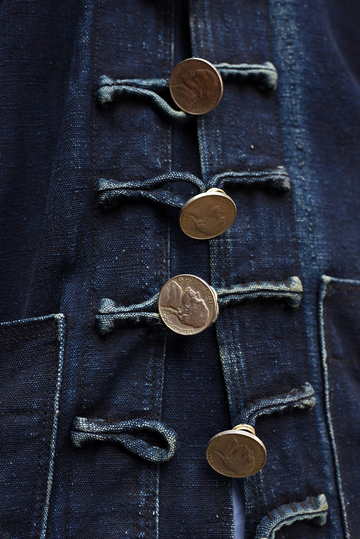  Buttons made with American nickels. 