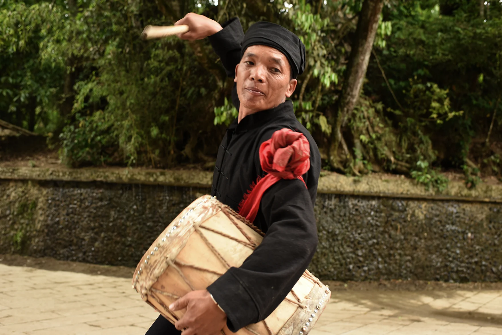 Inheritor of Mang Drum Dance Li Ke, Potuo village, Yunnan, 2017.