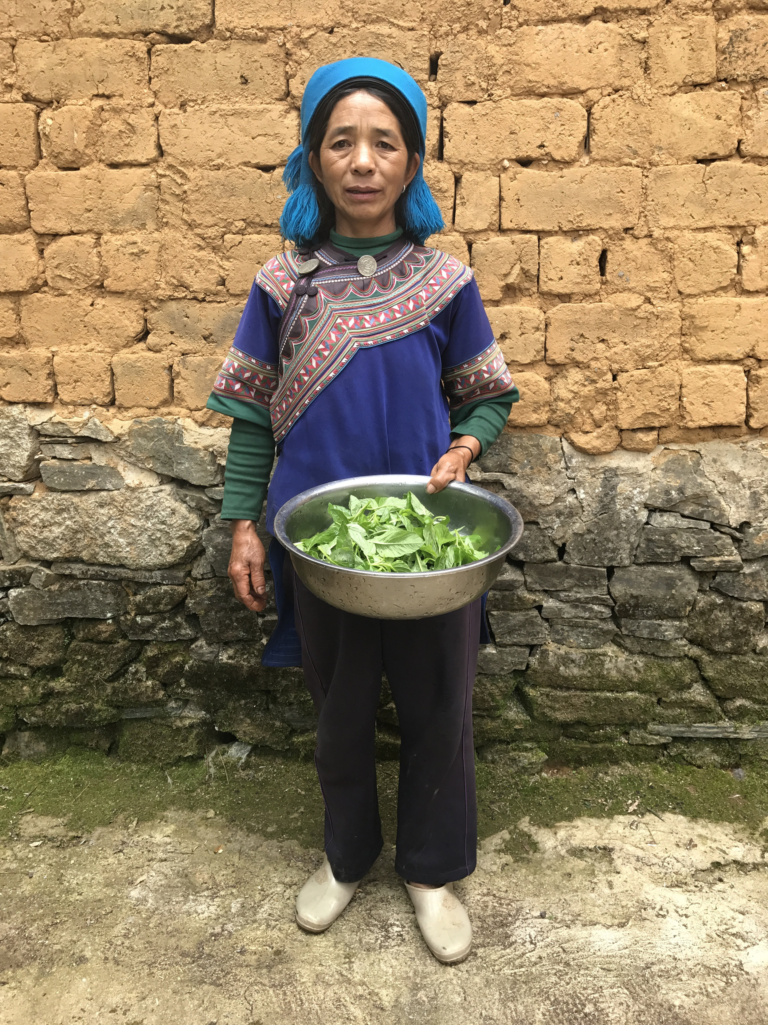  Hani woman preparing lunch, Luomo village, 2017. 