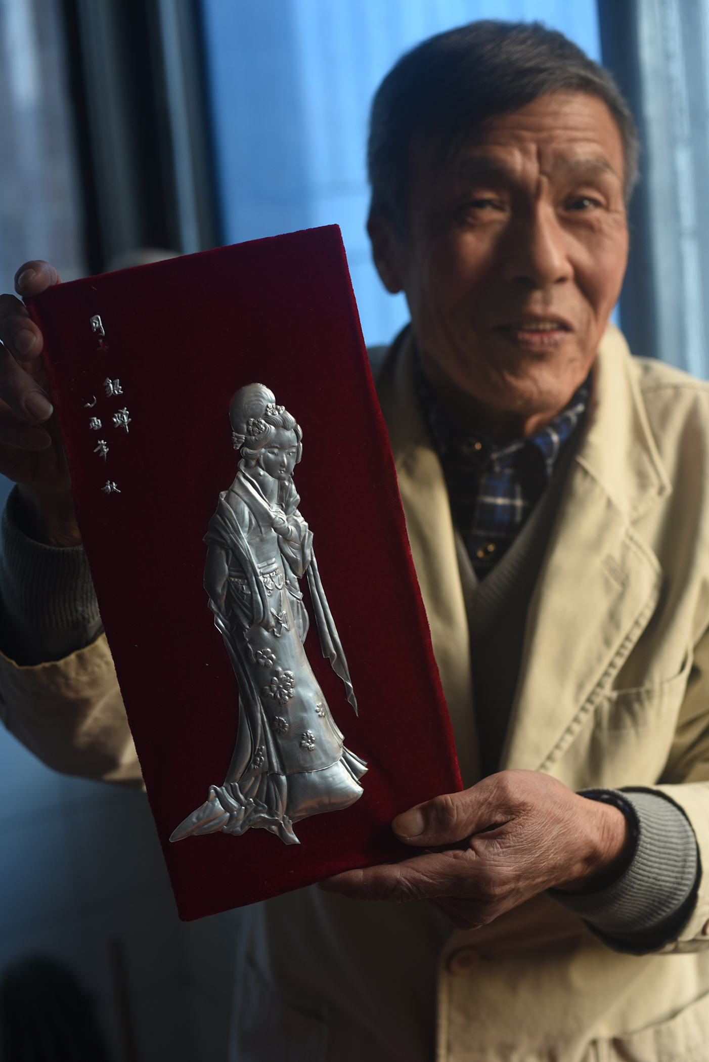  Wang Hualin, Inheritor of Intangible Culture Heritage, metalwork and egg sculpture, Jingzhou 