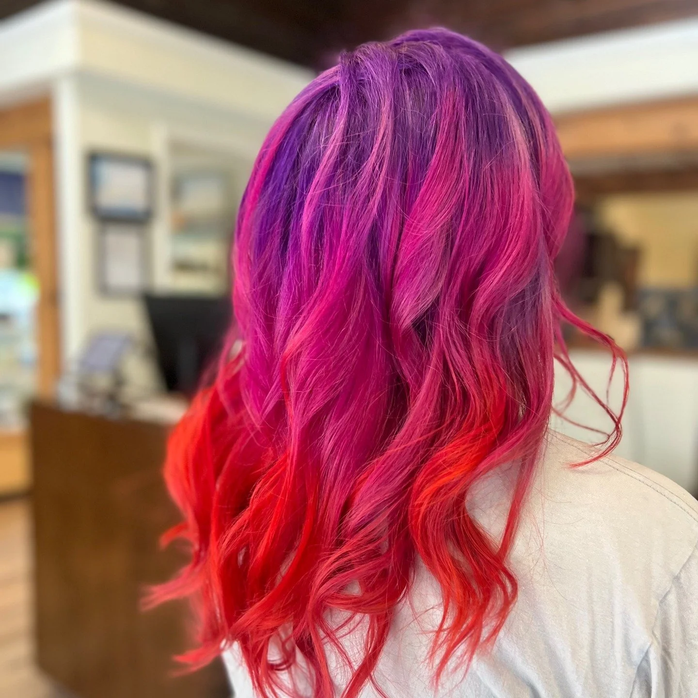 Purple haze meets lava glow. 🔥💜 This bold Aveda color creation by @jenny_partridge_hair at our Wallingford location is what vivid hair dreams are made of.

Aveda&rsquo;s 100% vegan color doesn&rsquo;t just turn heads&mdash;it nourishes your hair wi
