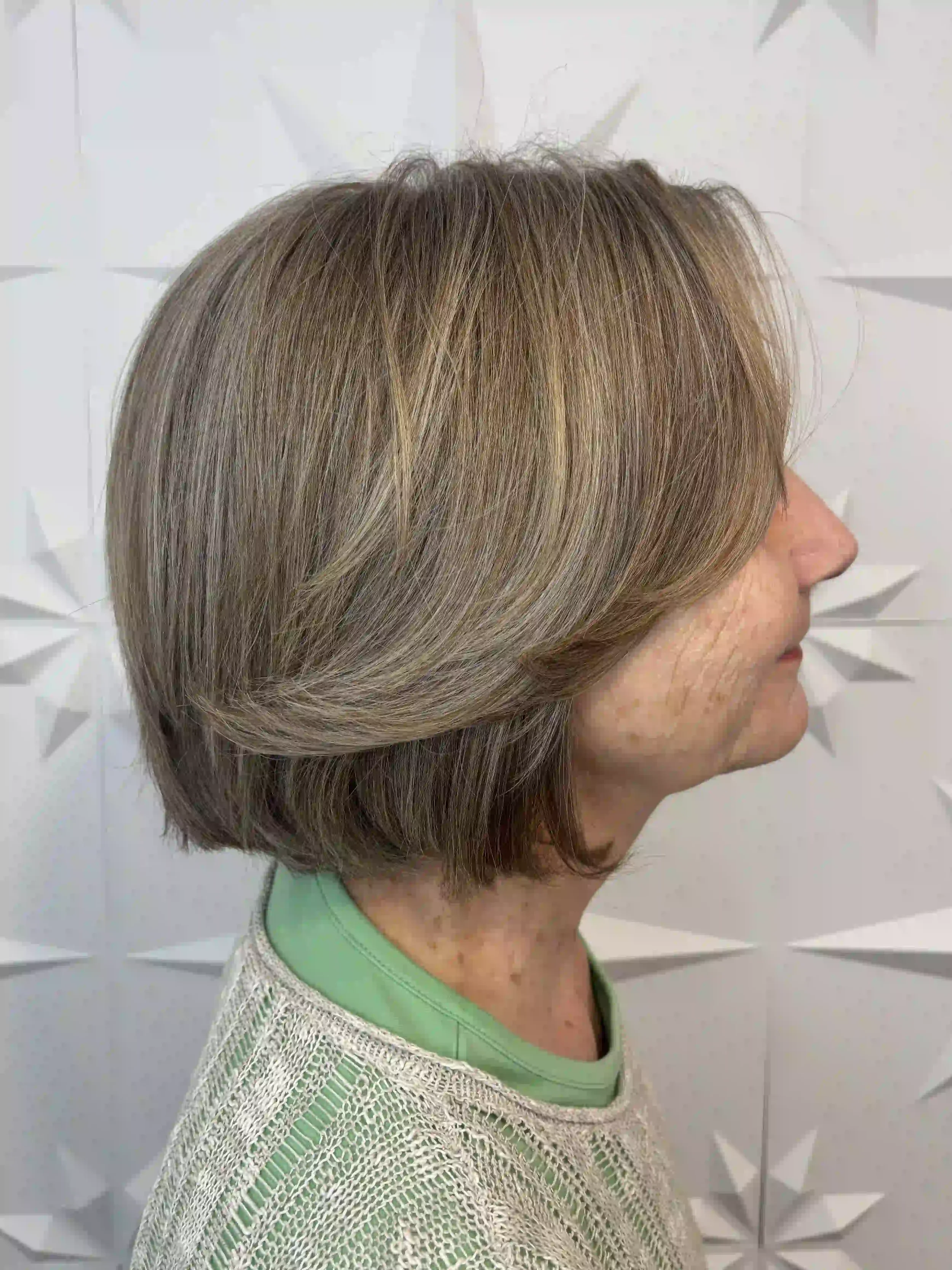 Layered gray bob with soft volume and face-framing movement, styled by Alpin at Chroma Salon Queen Anne Seattle for a natural, flattering shape.