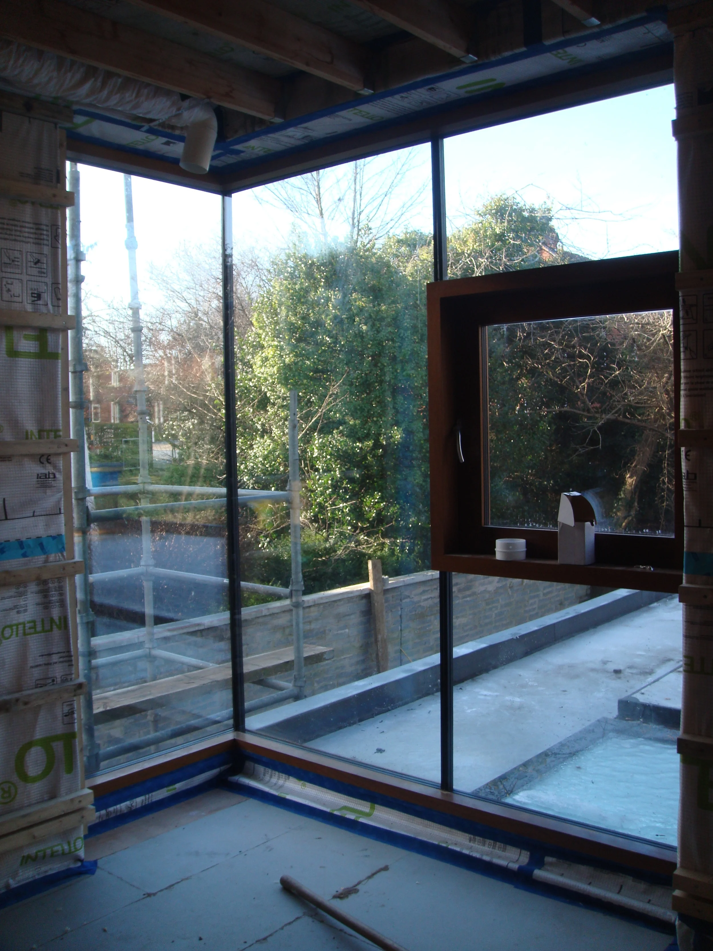 frameless glazed corner window