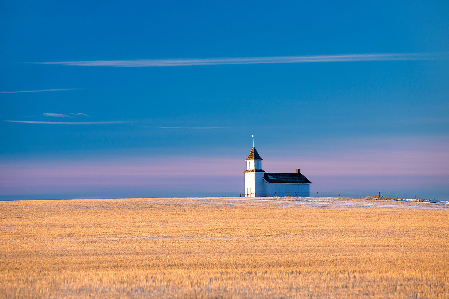 A small, rural church (no longer in use) sits high atop the Montana plains north of Dunkirk.&nbsp;→ Buy This Print