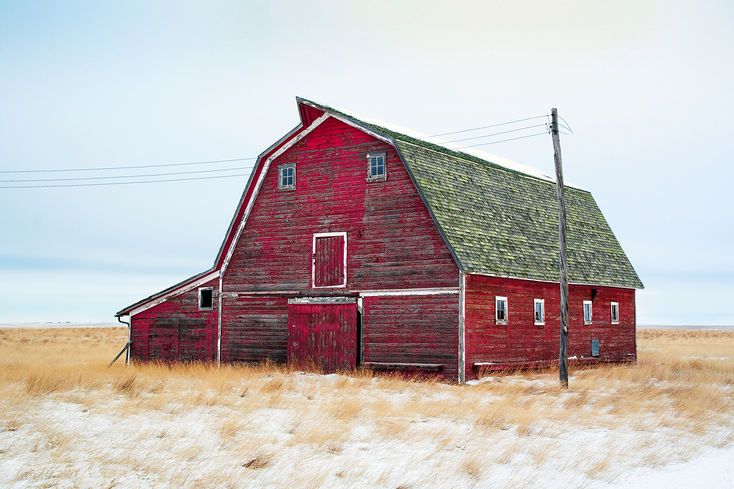 An old red barn on an abandoned farm north of Rudyard, Montana.&nbsp;→ Buy a Print