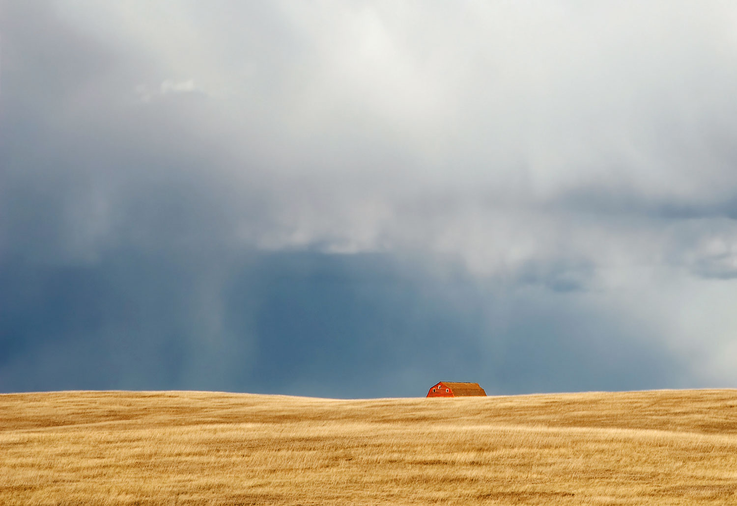 A storm looms large over the horizon somewhere on the plains of South Dakota.&nbsp;→ Buy a Print