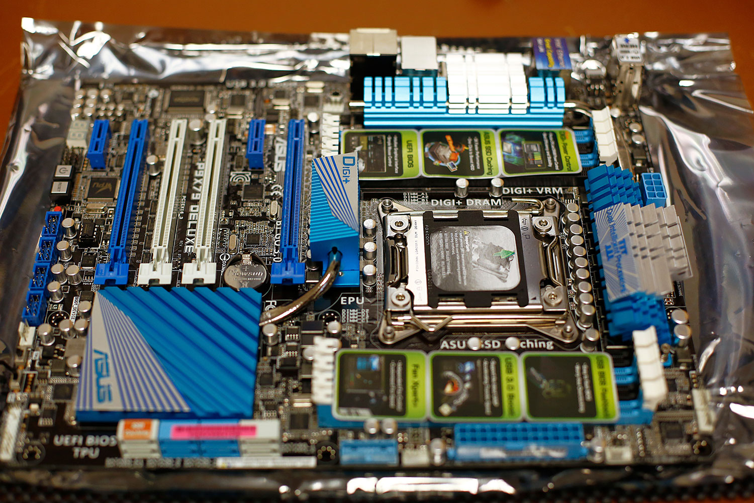 My new&nbsp;Asus P9X79 Deluxe motherboard sitting on the anti-static wrapper after unpackaging it.