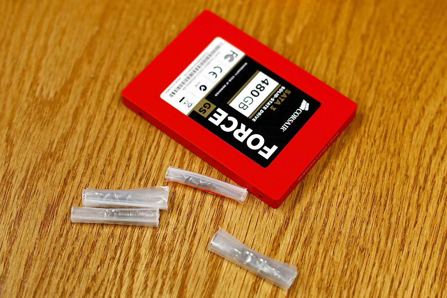 One of the two tiny 3.5" Corsair super fast 480GB solid state hard drives I purchased for my new computer.