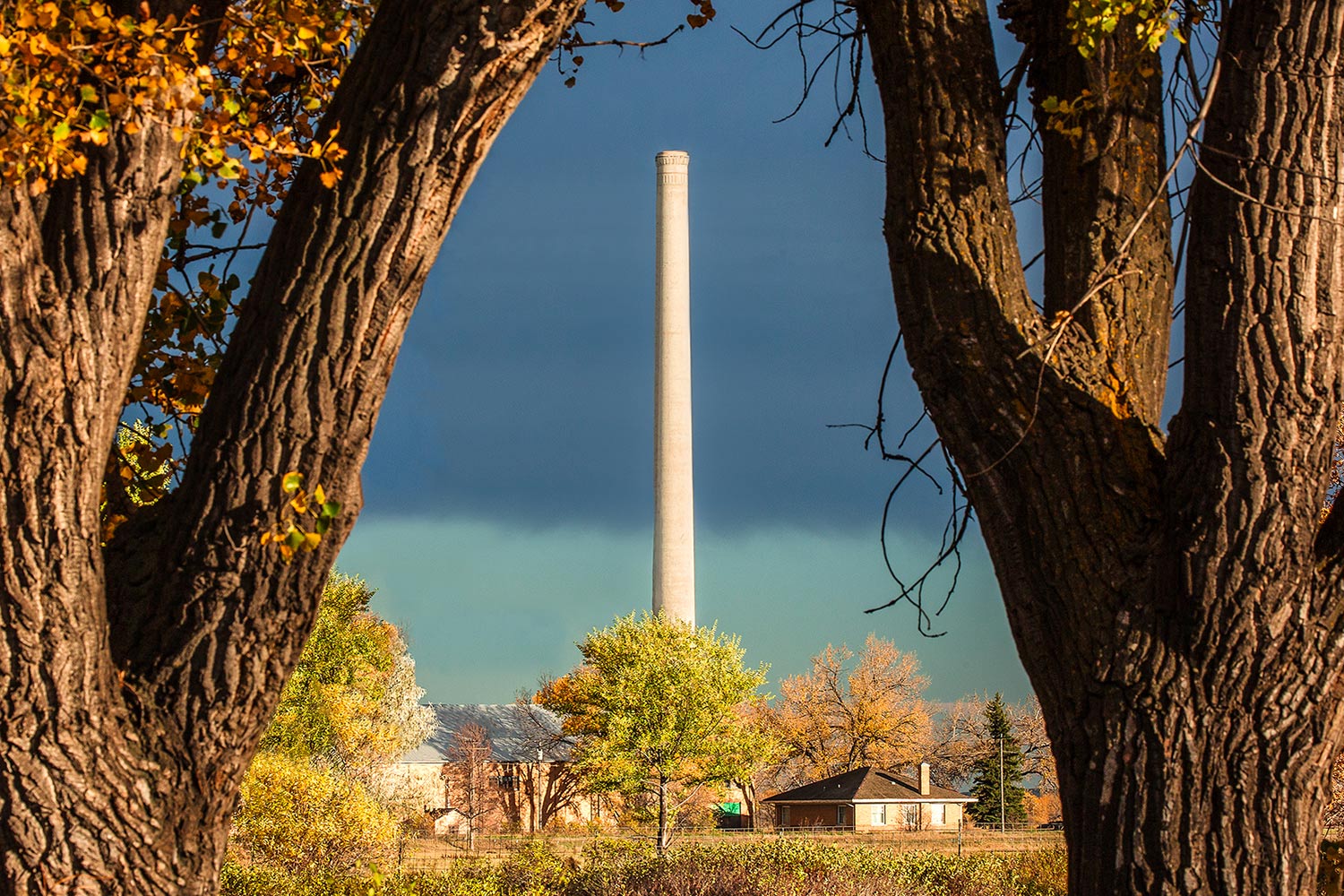 A photograph of the stately white smokestack that stands on the edge of Chinook, Montana.&nbsp;→ Buy a Print