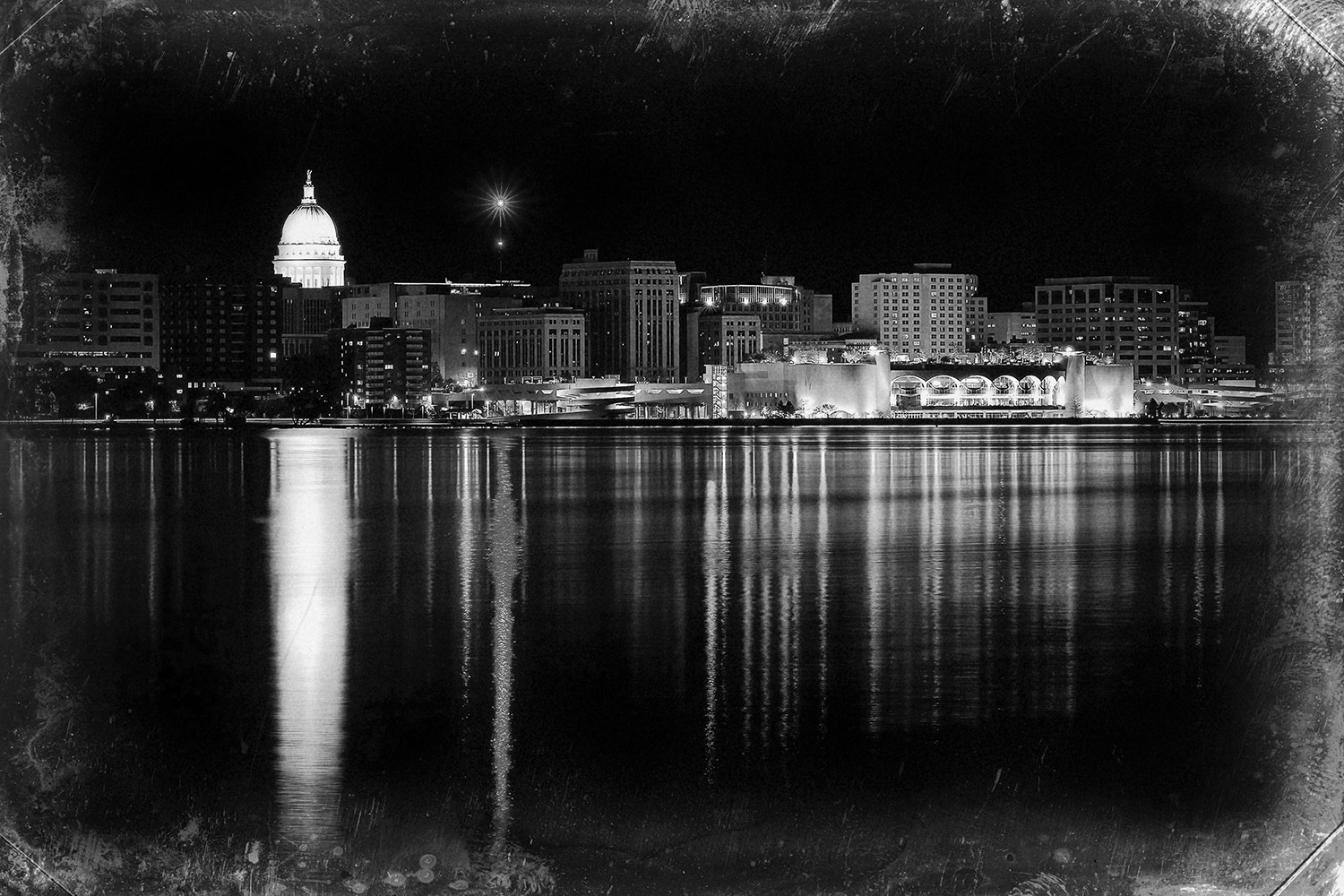 A photo of the Madison, Wisconsin skyline across Lake Monona with an old fashioned look and feel.&nbsp;→ Buy a Print