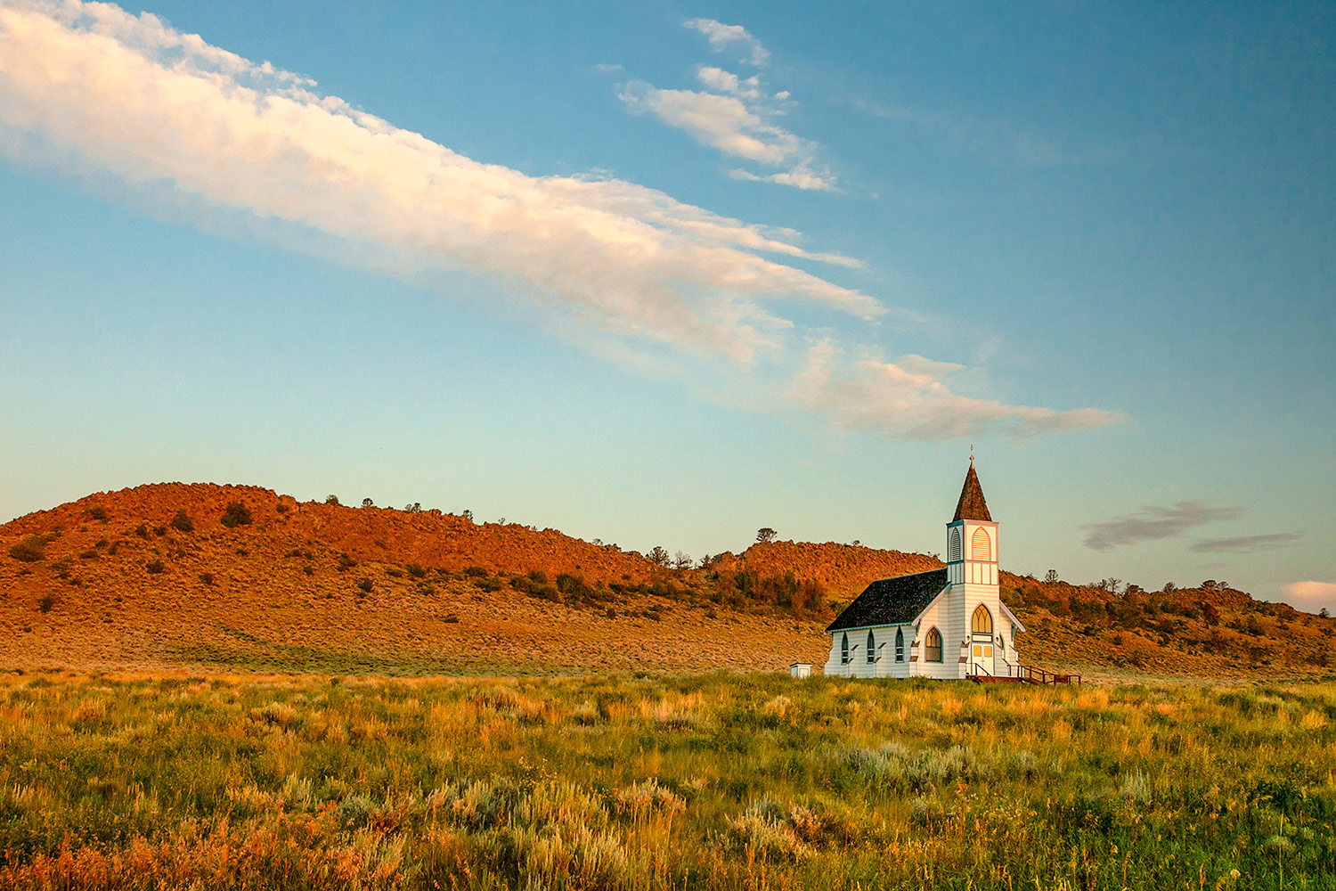 An old rustic rural country church illuminated by the morning light in Lennep, Montana.&nbsp;→ Buy a Print
