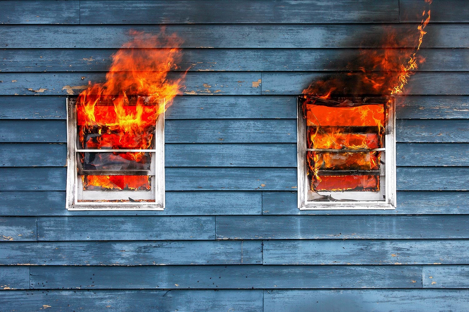 Flames leap from a burning house outside of Belleville, Wisconsin.&nbsp;→ Buy a Print