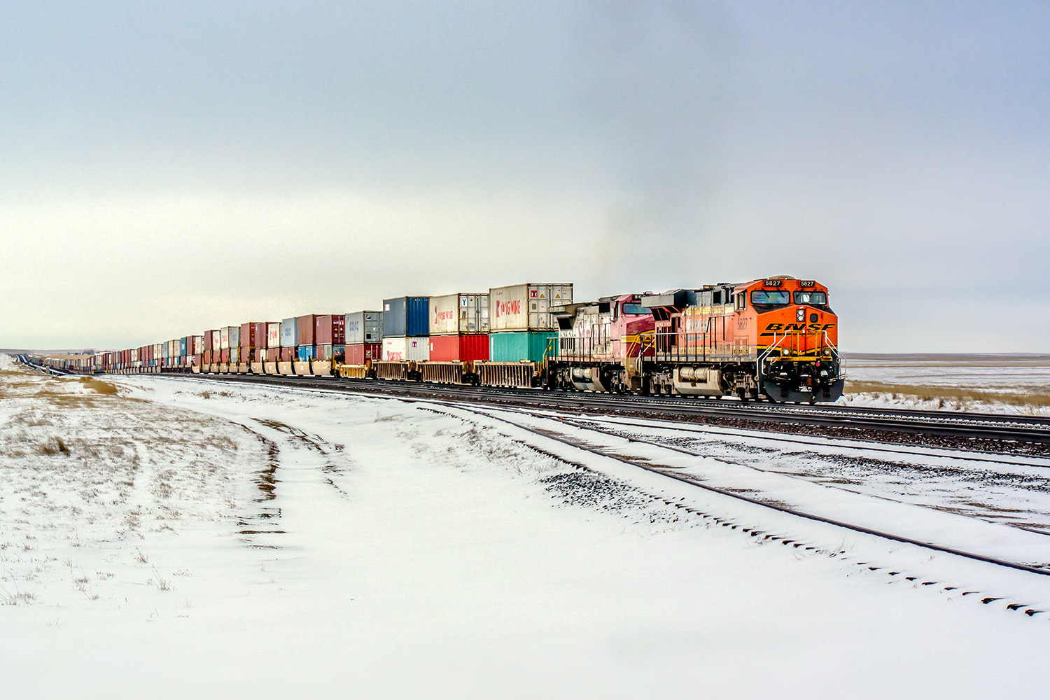 A BNSF train moving containers from ports on the west coast (probably Portland or Seattle) east along what was the former Great Northern Railway outside of Rudyard, Montana.&nbsp;→ Buy a Print&nbsp;or License Photo