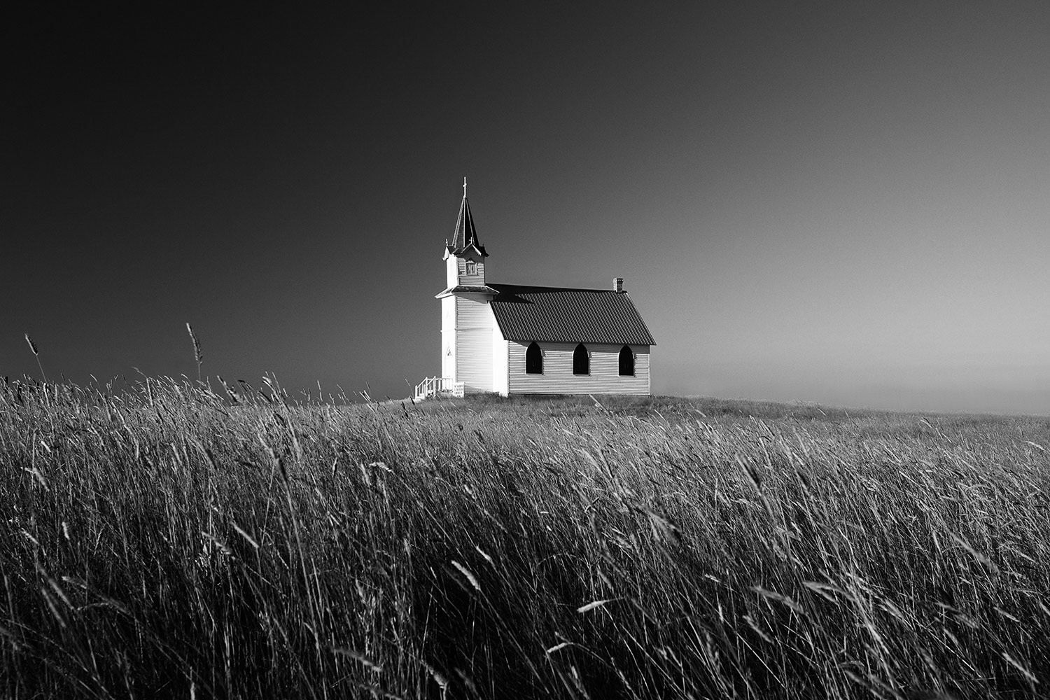 A beautiful rural church sits all alone on Montana's prairie south of Malta.&nbsp;→ Buy a Print&nbsp;or License Photo