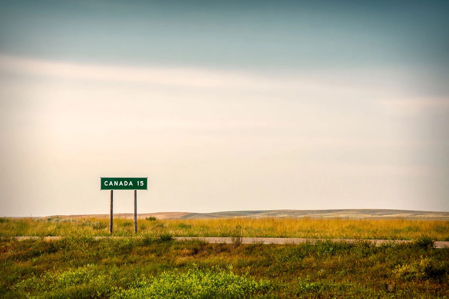The view along Wild Horse Road, just a few miles from the Canadian border, which is among the most desolate places in the United States, north of Havre, Montana. → Buy a Print