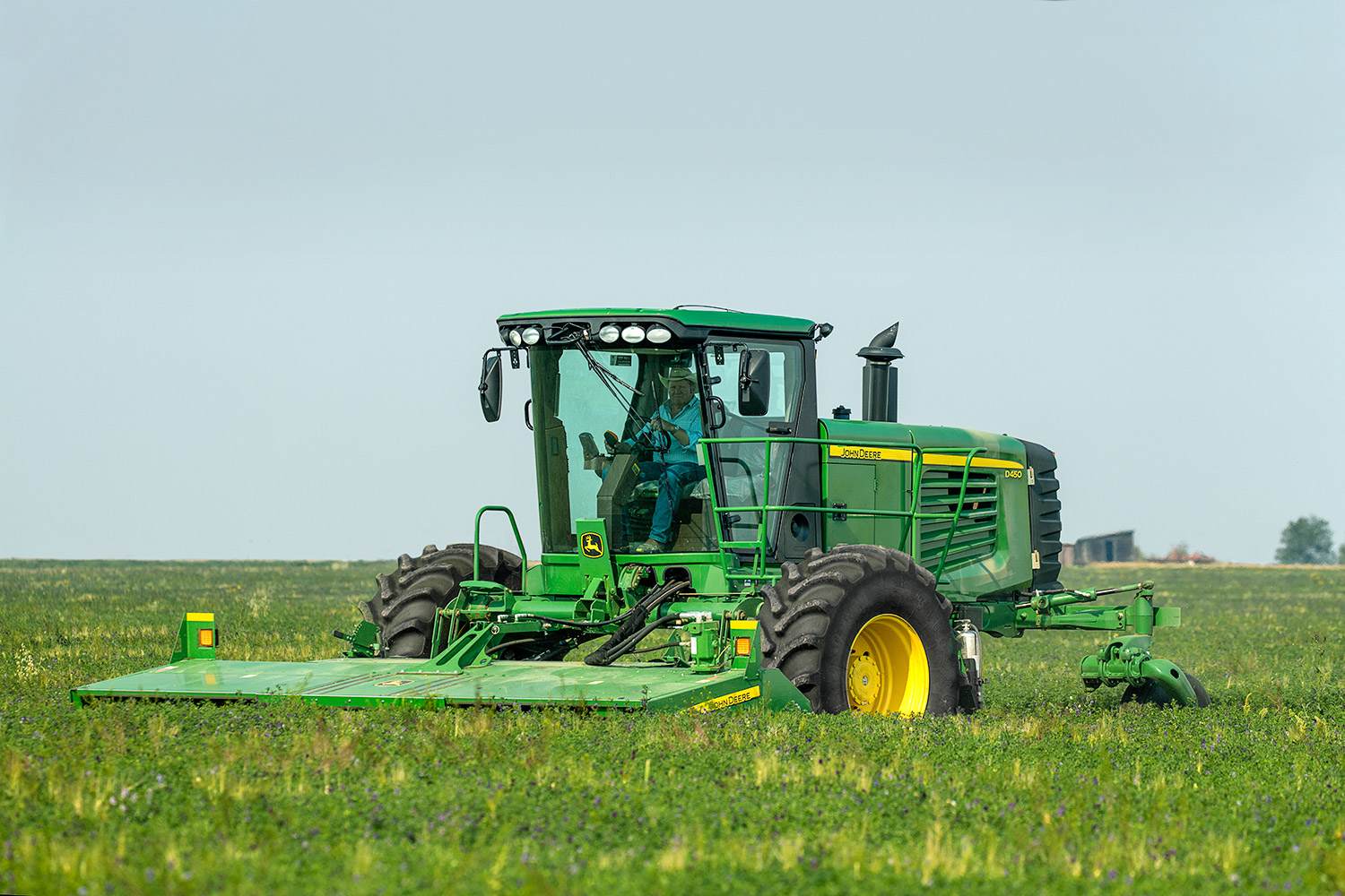 A farmer cuts alfalfa on a farm west of Valier, Montana.&nbsp;→ Buy a Print&nbsp;or License Photo