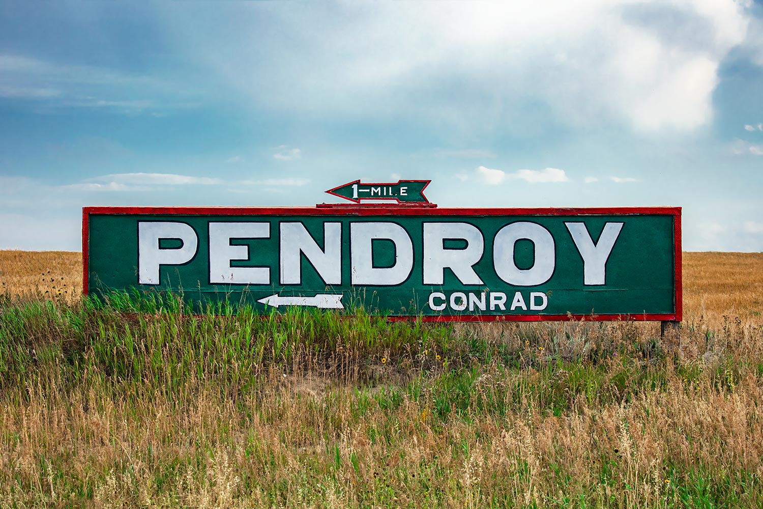 A cool old sign at the intersection of U.S. Highway 89 and Highway 219 directing people to the tiny town of Pendroy, Montana.&nbsp;→ Buy a Print&nbsp;or License Photo