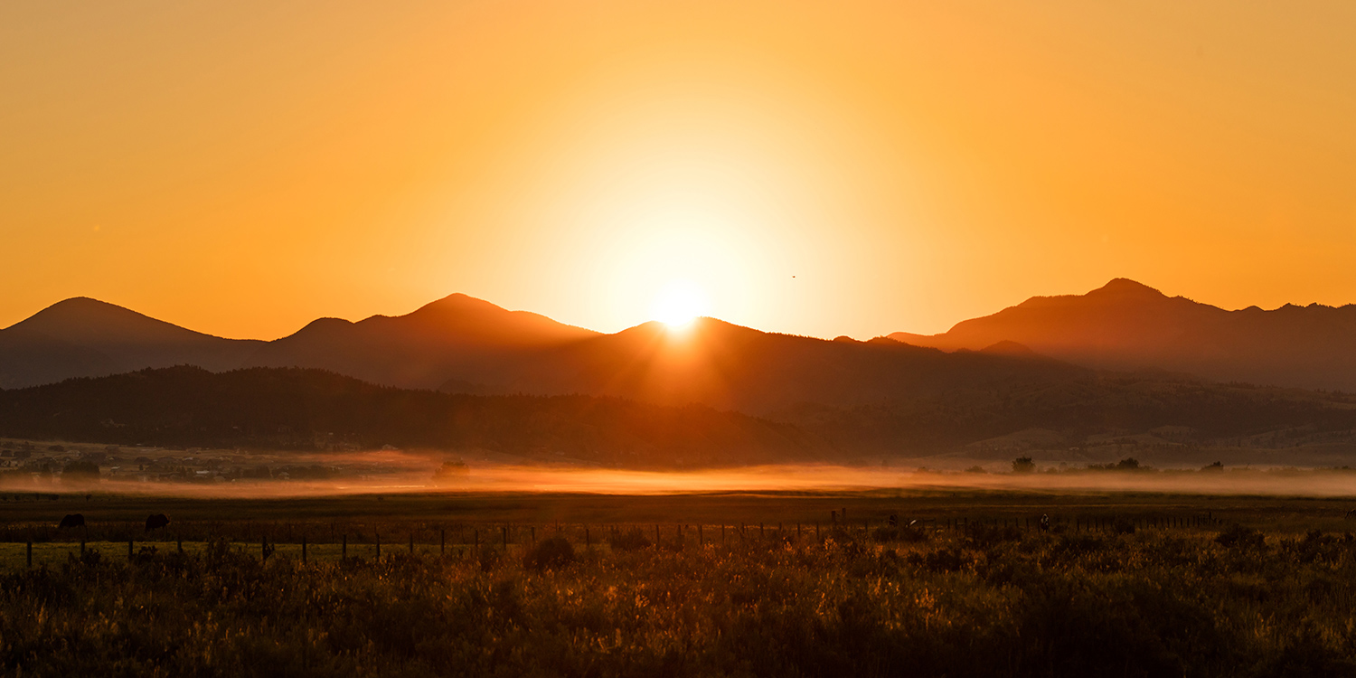 The sun rises over the Big Belt Mountains near Helena, Montana.
