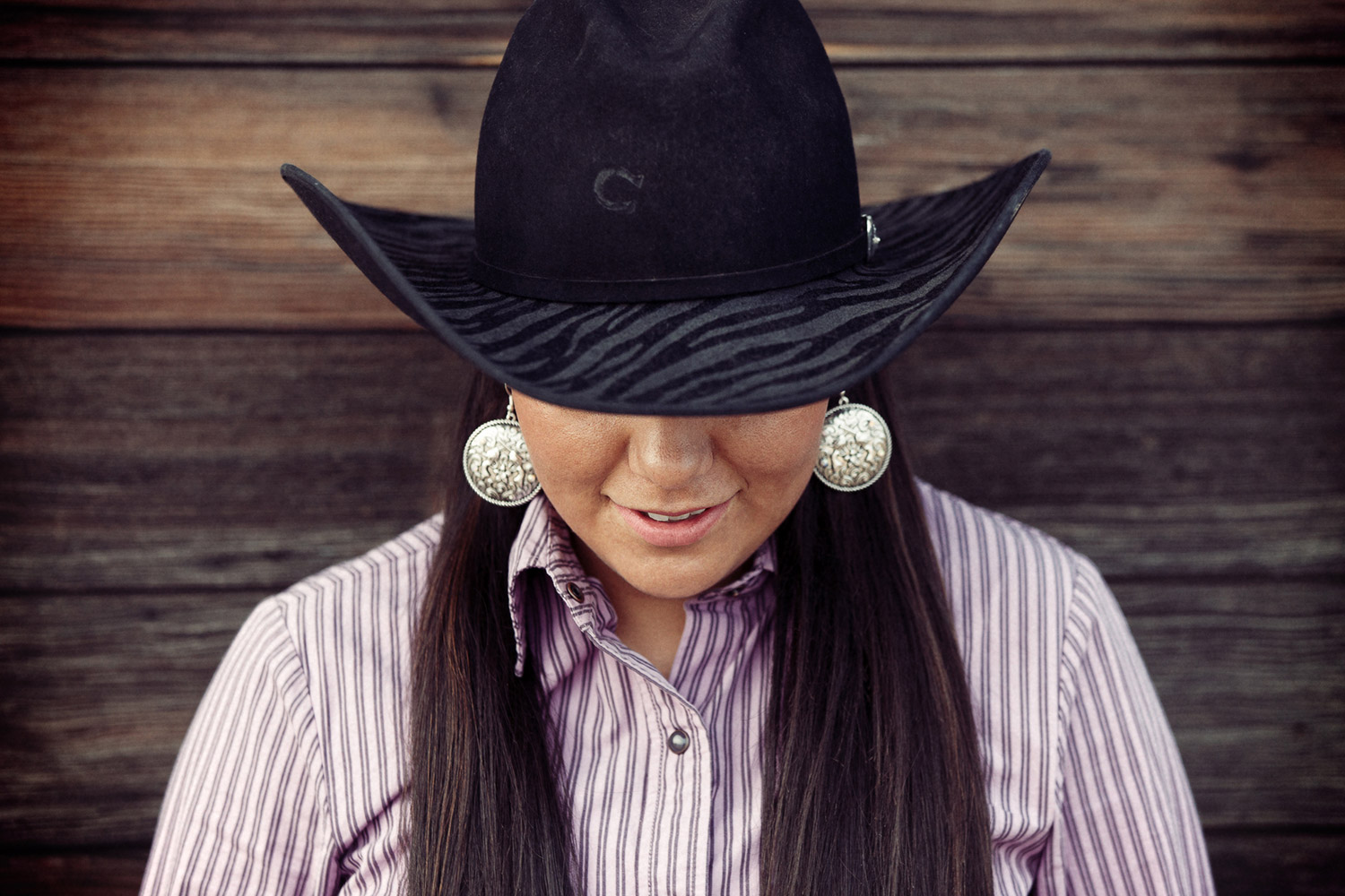 More cowgirl photos; this one is of a member of the MSU-Northern rodeo team poses for me outside of Havre, Montana.