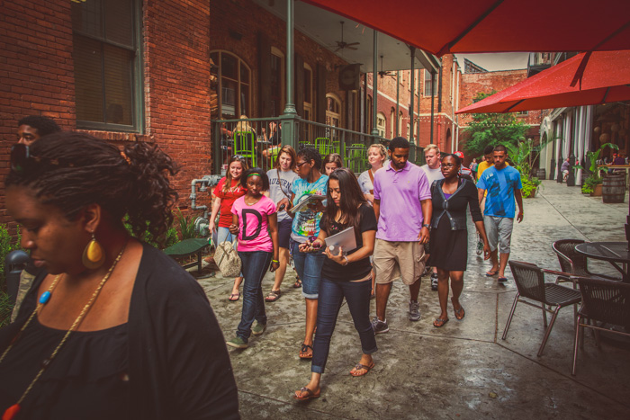 Walking through the Alley Station in downtown Montgomery during orientation week.