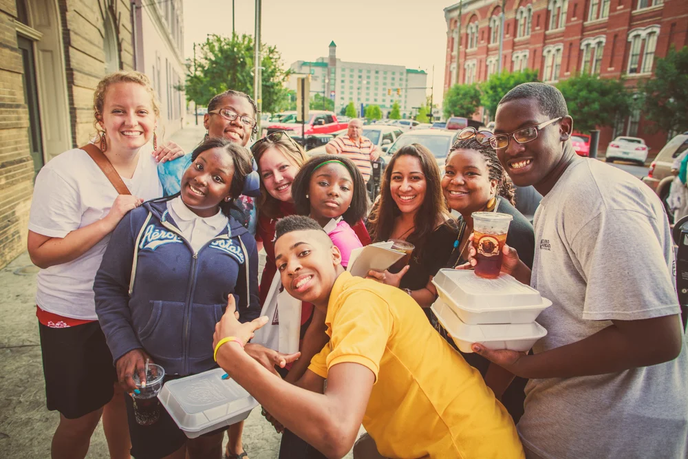 Interns, staff, and high school students in the program head downtown to eat bbq at dreamland.